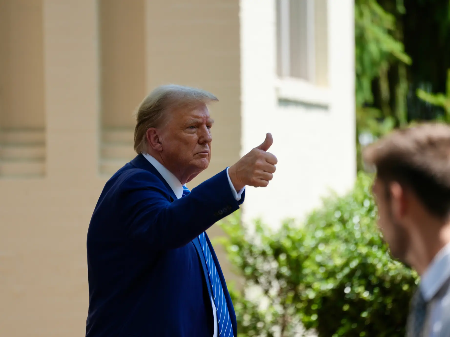 Donald Trump with a thumbs up