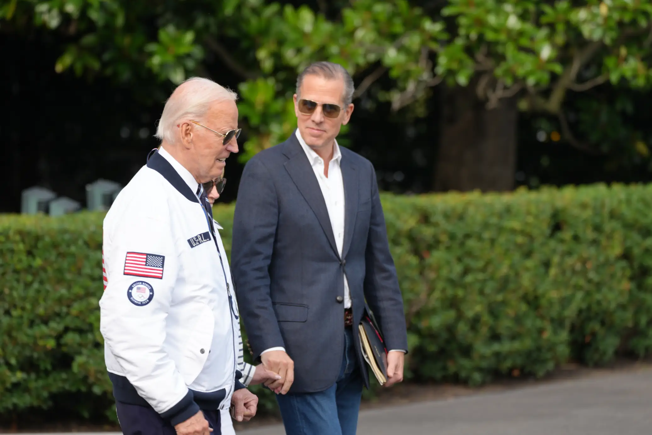 Hunter Biden and President Joe Biden talk at the White House