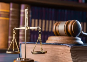 Stock image of court gavel and law books