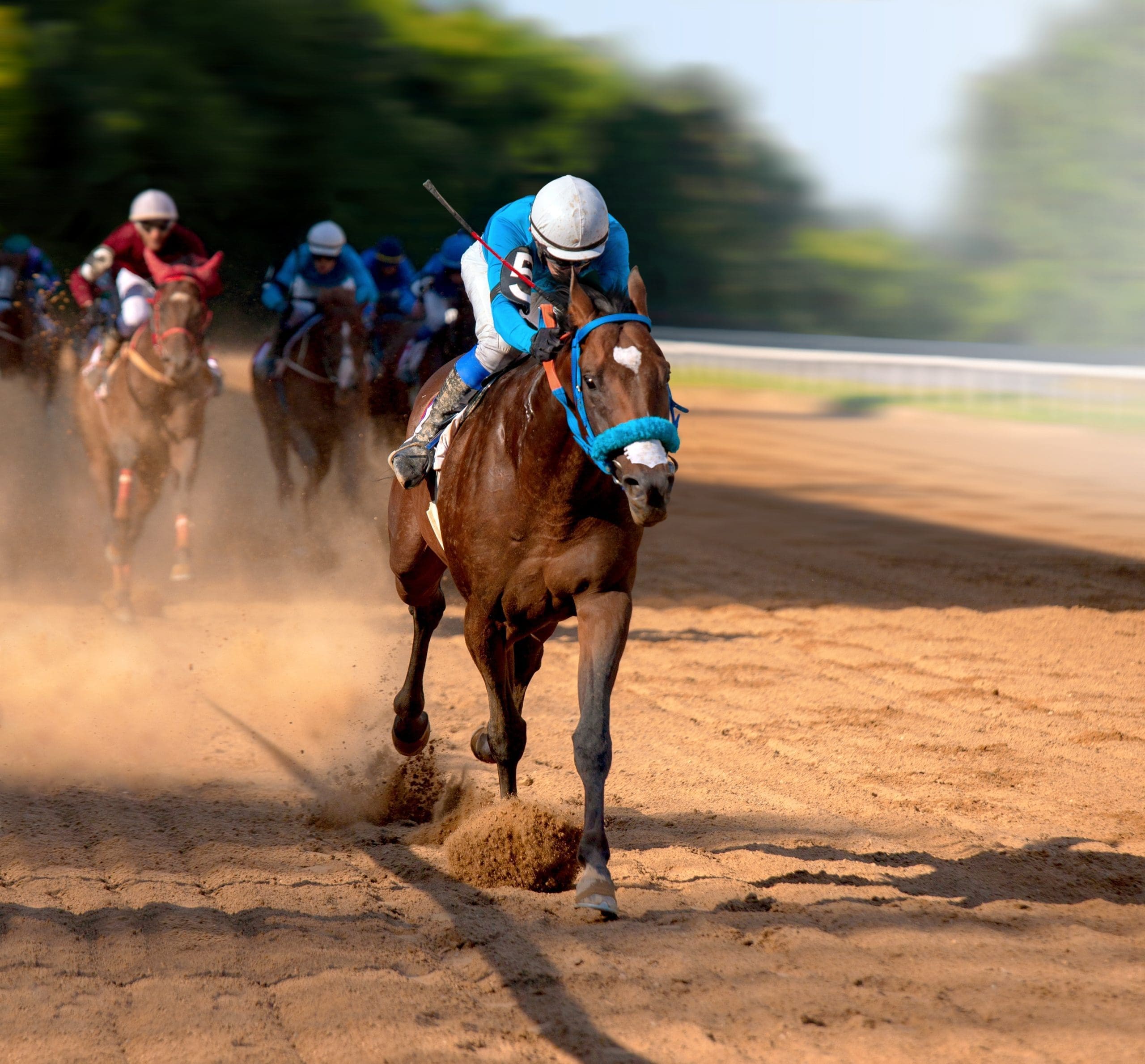 Jockeys racing at the Kentucky Derby
