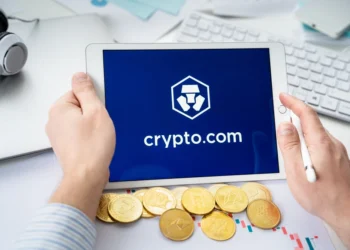 Stock photo of Crypto.com being used with coines below